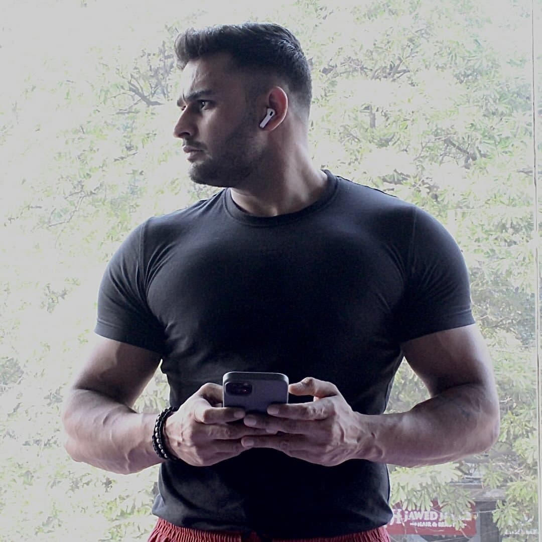 Rudhra, founder and head coach of CoachedByRudhra, an online personal trainer and nutrition coach.